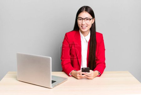 Photo for Young adult pretty asian businesswoman.  desk and laptop concept - Royalty Free Image