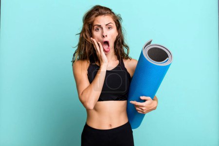 Photo for Hispanic pretty woman feeling shocked and scared. fitness and yoga concept - Royalty Free Image