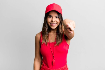 Photo for Hispanic pretty woman pointing at camera choosing you sport coach concept - Royalty Free Image