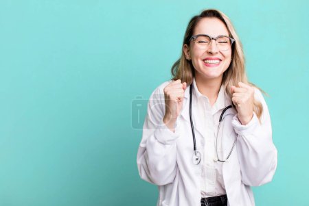 Photo for Feeling shocked,laughing and celebrating success. medicine student or physician - Royalty Free Image