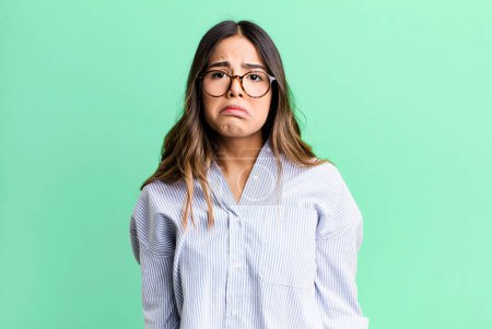 Photo for Hispanic pretty woman feeling sad and whiney with an unhappy look, crying with a negative and frustrated attitude - Royalty Free Image