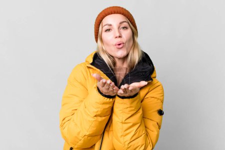 Photo for Pretty caucasian woman wearing an anorak. cold and winter concept - Royalty Free Image