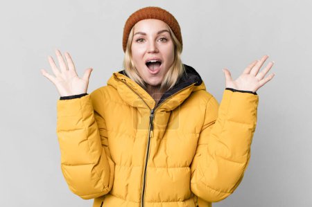 Photo for Pretty caucasian woman wearing an anorak. cold and winter concept - Royalty Free Image