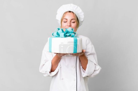 Photo for Pretty caucasian restaurant chef woman cooking a cake - Royalty Free Image