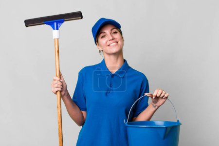 Photo for Pretty caucasian windows washer worker woman - Royalty Free Image