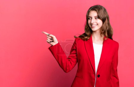 Photo for Caucasian pretty blonde womanwearing a red blazer. businesswoman concept - Royalty Free Image