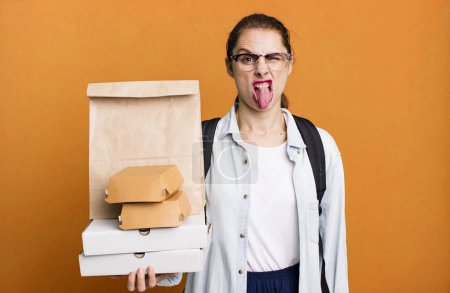 Photo for Pretty hispanic woman feeling disgusted and irritated and tongue out. delivery fast food take away concept - Royalty Free Image