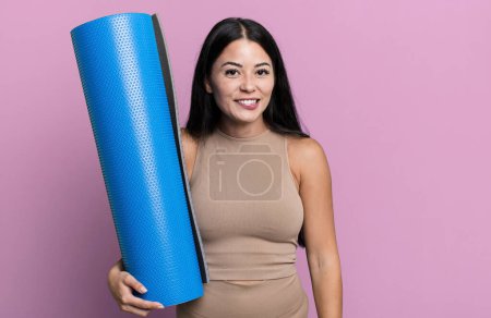 Photo for Hispanic pretty woman looking puzzled and confused yoga concept - Royalty Free Image
