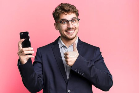 Foto de Young adult caucasian businessman with a smartphone - Imagen libre de derechos