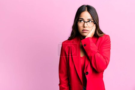 Photo for Hispanic pretty woman feeling bored, frustrated and sleepy after a tiresome. businesswoman concept - Royalty Free Image