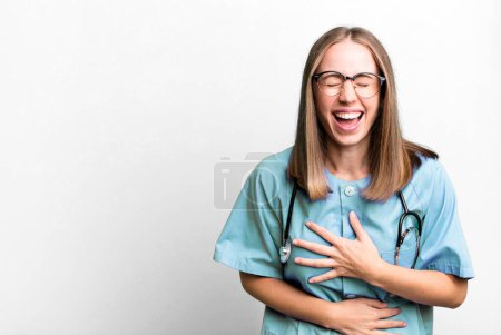 Téléchargez les photos : Rire à haute voix à une blague hilarante. concept d'infirmière - en image libre de droit
