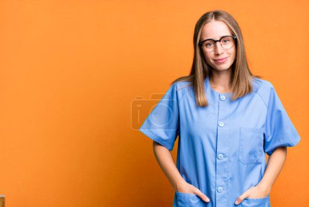 Photo for Pretty blonde nurse woman with a copy space - Royalty Free Image