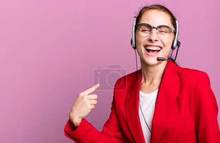Photo for Young adult pretty businesswoman. telemarketing agent concept - Royalty Free Image