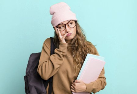 Photo for Hispanic pretty woman feeling bored, frustrated and sleepy after a tiresome. university student concept - Royalty Free Image