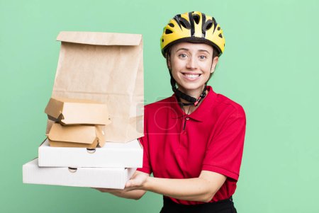 Photo for Pretty blonde deliverywoman with a paper bag - Royalty Free Image