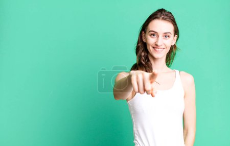 Photo for Young pretty woman pointing at camera choosing you - Royalty Free Image