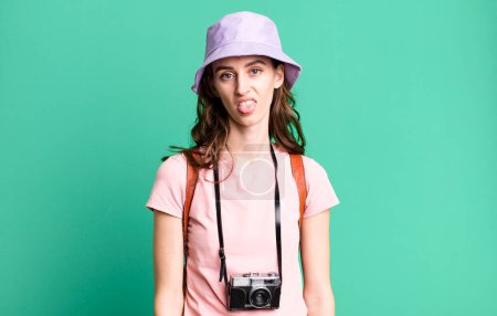 Photo for Young pretty woman feeling disgusted and irritated and tongue out. tourist concept - Royalty Free Image