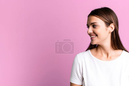 Photo for Young pretty woman with a copy space to the side - Royalty Free Image