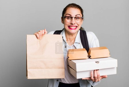 Téléchargez les photos : Young adult pretty woman with take away delivery fast food boxes - en image libre de droit