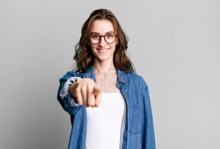 young pretty woman pointing at camera choosing you-stock-photo