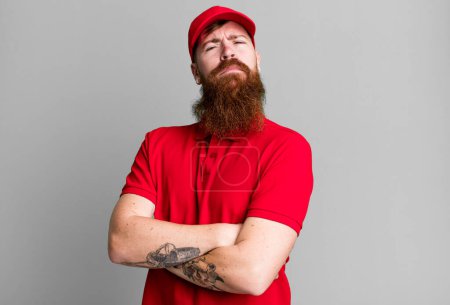 Téléchargez les photos : Jeune adulte cheveux roux barbu cool entreprise employé homme - en image libre de droit