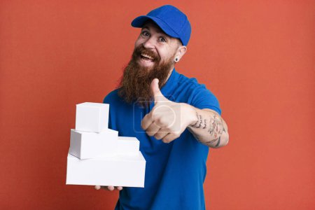 Photo for Young adult red hair bearded cool delivery man with boxes - Royalty Free Image