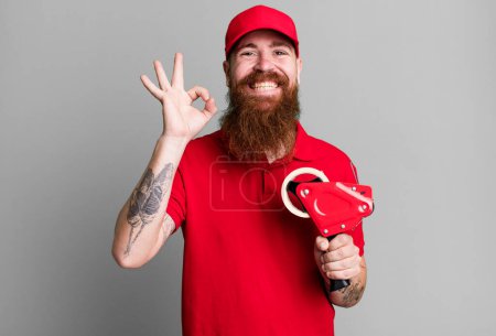 Photo for Long beard man feeling happy, showing approval with okay gesture. shipping packer concept - Royalty Free Image