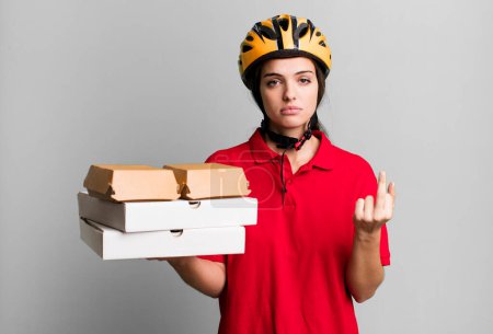 Photo for Young pretty woman feeling angry, annoyed, rebellious and aggressive. pizza delivery concept - Royalty Free Image