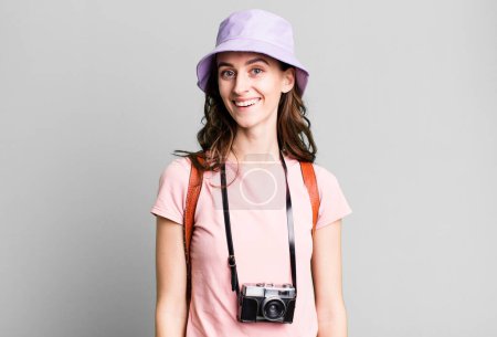 Photo for Young pretty woman looking happy and pleasantly surprised. tourist concept - Royalty Free Image