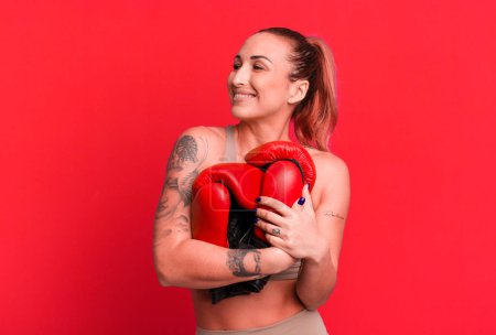 Foto de Young pretty woman boxing and fitness concept - Imagen libre de derechos
