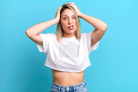 Photo for Blonde adult woman feeling frustrated and annoyed, sick and tired of failure, fed-up with dull, boring tasks - Royalty Free Image