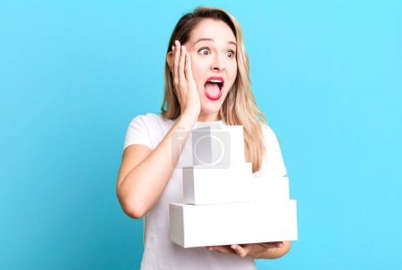 Photo for Feeling happy, excited and surprised. white boxes concept - Royalty Free Image