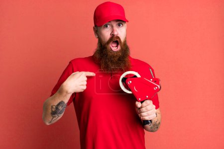 Photo for Long beard man feeling happy and pointing to self with an excited. shipping packer concept - Royalty Free Image