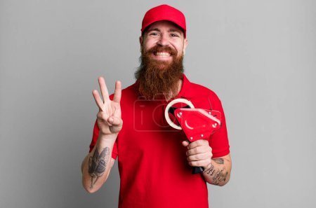 Photo for Long beard man smiling and looking friendly, showing number three. shipping packer concept - Royalty Free Image