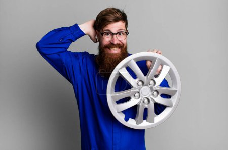 Photo for Long beard man feeling stressed, anxious or scared, with hands on head. car mechanic concept - Royalty Free Image
