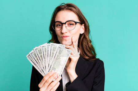 Photo for Young pretty businesswoman with dollar banknotes - Royalty Free Image