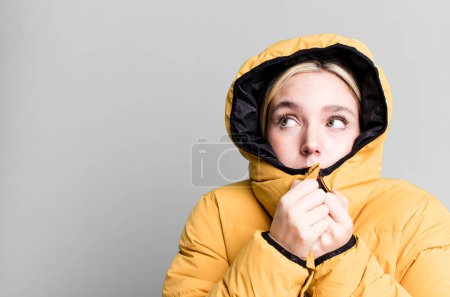 Photo for Young pretty woman wearing an anorak - Royalty Free Image