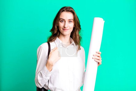 Photo for Young pretty woman feeling happy and pointing to self with an excited. architect concept - Royalty Free Image