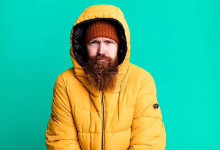 Photo for Long beard and red hair cool man wearing hat and coat. cold and winter concept - Royalty Free Image