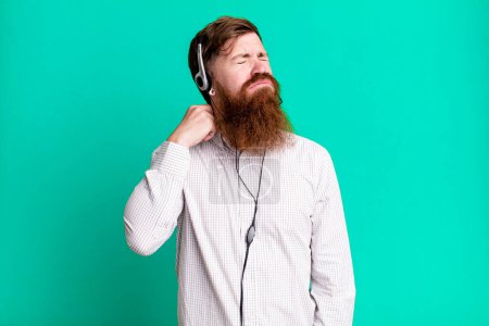 Photo for Long beard man feeling stressed, anxious, tired and frustrated. telemarketer agent concept - Royalty Free Image