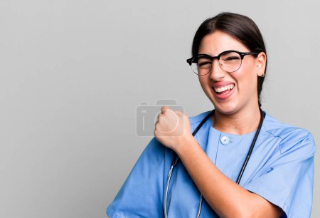 Photo for Feeling happy and facing a challenge or celebrating. nurse concept - Royalty Free Image