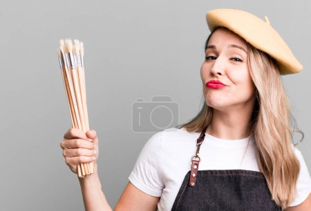 Photo for Pretty caucasian artist woman with brushes - Royalty Free Image