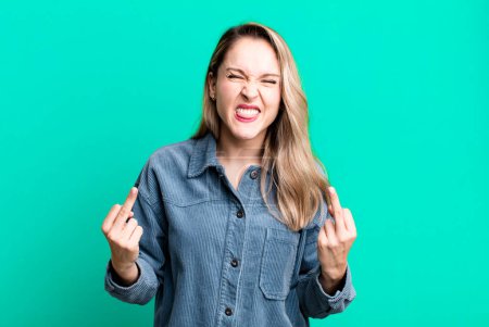 Photo for Feeling provocative, aggressive and obscene, flipping the middle finger, with a rebellious attitude - Royalty Free Image