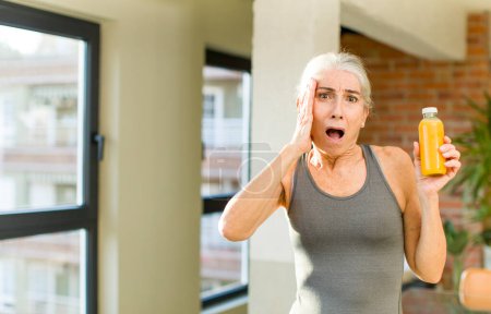 Photo for Pretty senior woman feeling extremely shocked and surprised. fitness concept - Royalty Free Image