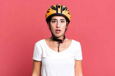 Photo for Looking very shocked or surprised. bike helmet concept - Royalty Free Image