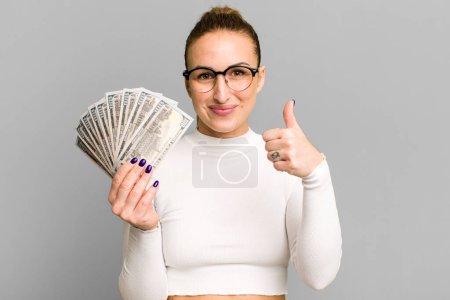 Photo for Young pretty woman with dollar banknotes - Royalty Free Image