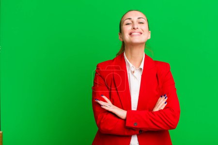 Téléchargez les photos : Young pretty businesswoman wearing red blazer - en image libre de droit