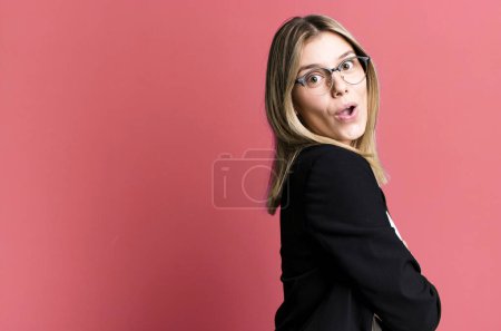 Photo for Young pretty woman with a copy space to the side - Royalty Free Image