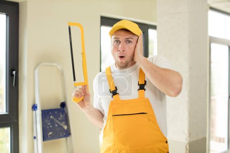 Photo for Feeling extremely shocked and surprised. handyman concept - Royalty Free Image