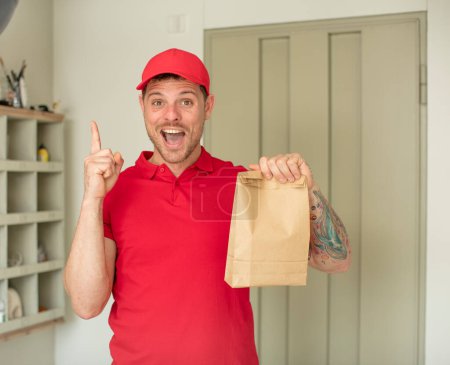 Photo for Feeling like a happy and excited genius after realizing an idea. delivery take away concept - Royalty Free Image